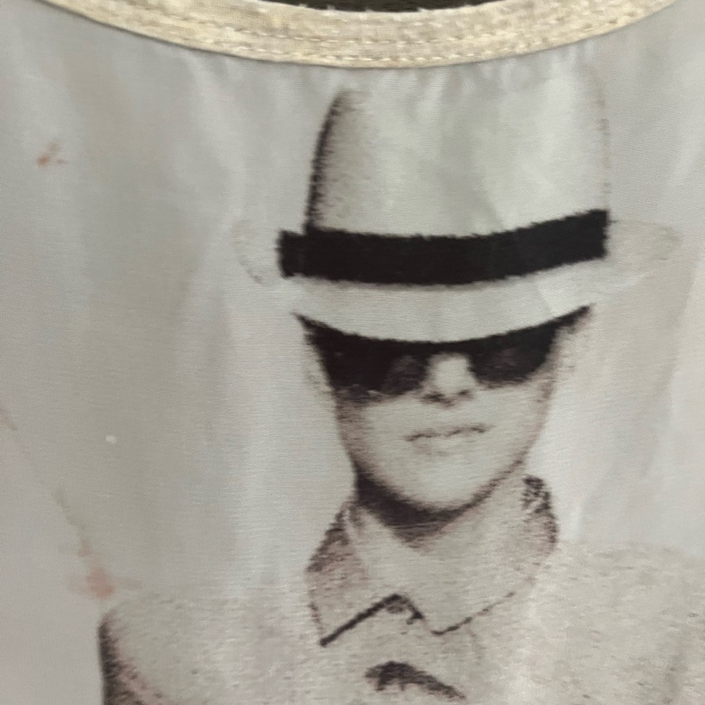 Stylish Graphic Tee with Hat and Sunglasses Design